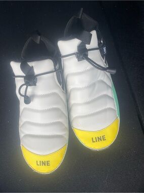 LINE Men's White Slip-On Boat Shoes with Yellow Toe